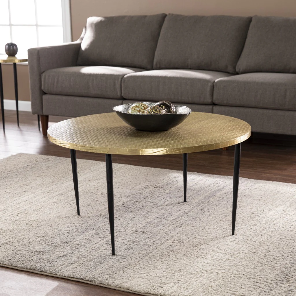 34" Black And Gold Embossed Metal Round Coffee Table By Homeroots